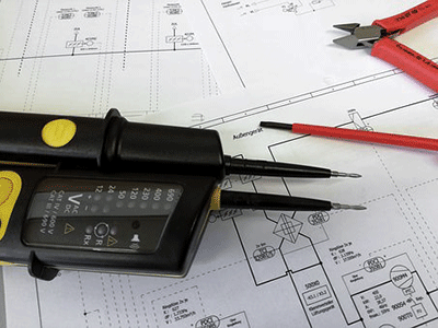 Image of drawings and equipment for article on building regulations for extensions